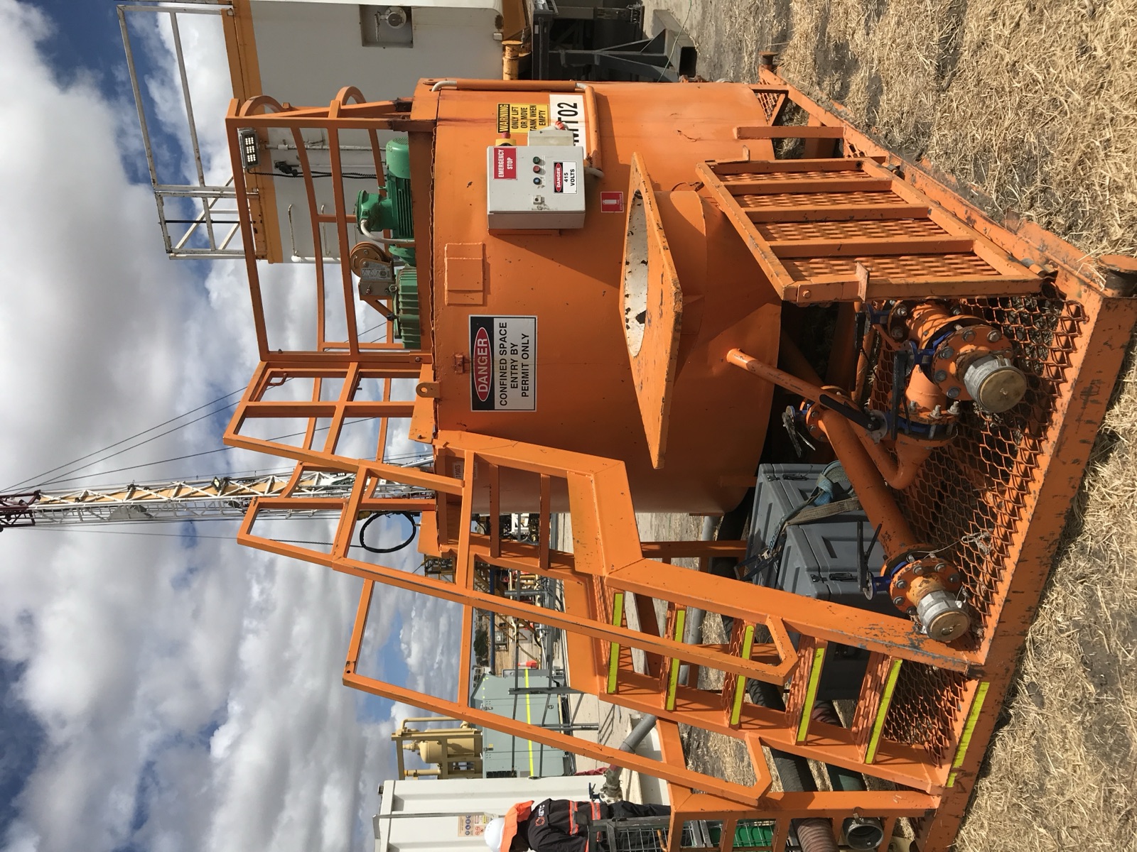 Confined space entry permit signage on a drill site mud tank