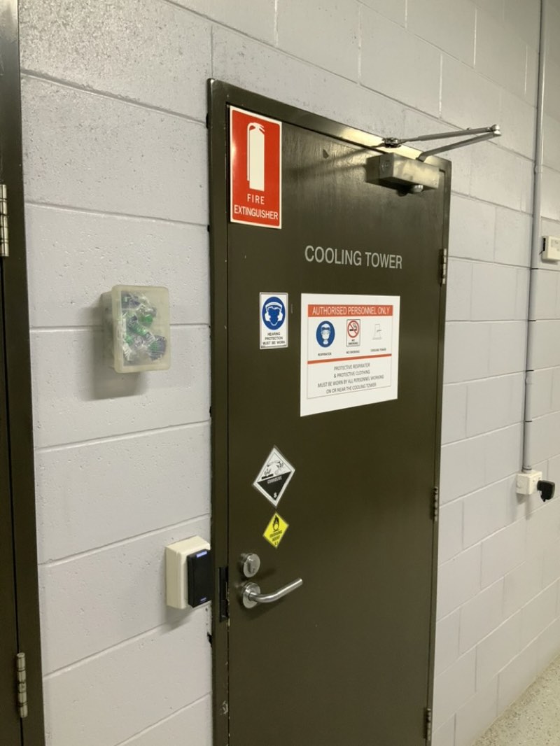 Cooling tower access door during an environmental health inspection